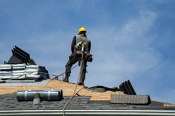 Professional Gutter Installation technician working in Bellmore, NY